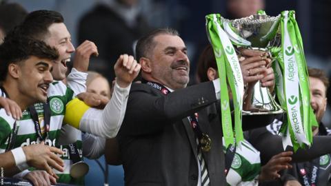 Celtic manager Ange Postecoglou with the League Cup trophy