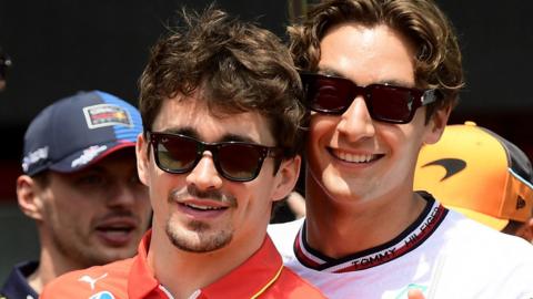 Ferrari's Charles Leclerc and Mercedes' George Russell during the drivers' pre-race parade at Imola