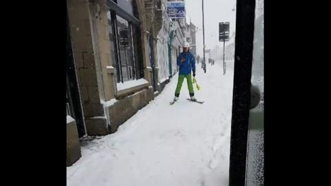 Snow has blanketed most of the North East but this man had a different way of getting around.