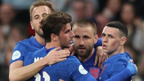 England celebrate Luke Shaw's equaliser against Switzerland