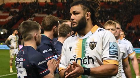 Lewis Ludlam leaves the pitch following Northampton's defeat at Bristol