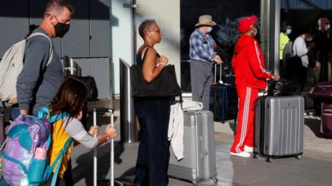 Travelers depart ahead of the Thanksgiving holiday during the coronavirus disease (COVID-19) pandemic, in Atlanta, Georgia