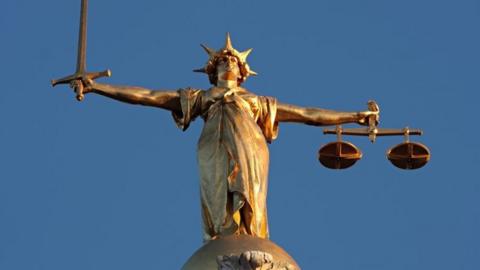 The figure of Lady Justice, at the top of the dome of the Old Bailey