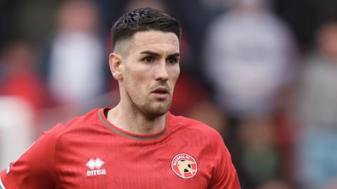 Conor Wilkinson playing for Walsall