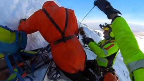The climbers got stuck 2,300m (7,500ft) up Italy's Monte Mondolè.