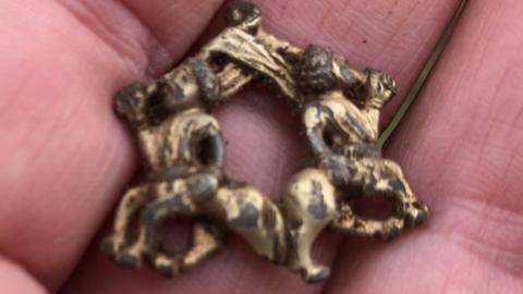 The brooch shortly after it was found