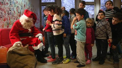 Santa and migrant children