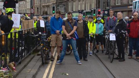 Cyclists stage minute's silence