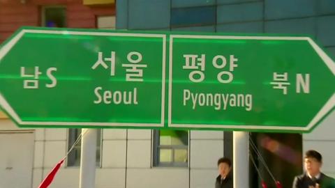 Signposts to capitals of North and South Korea