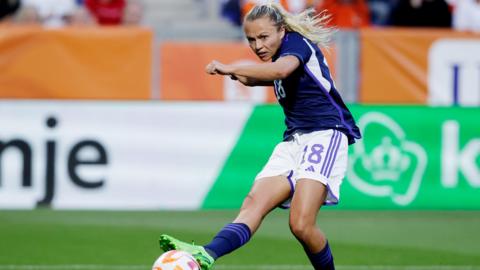 Claire Emslie scores for Scotland against the Netherlands