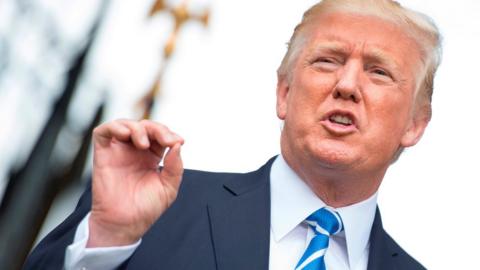 Donald Trump speaks to the press at his golf club in New Jersey