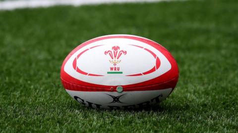 Rugby ball bearing the WRU logo