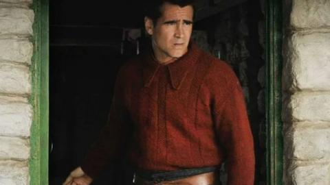 Colin Farrell wearing the red jumper
