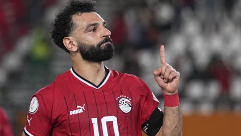 Egypt captain Mohamed Salah celebrates scores from the penalty spot against Mozambique at the 2023 Africa Cup of Nations