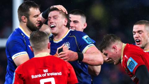 Leinster celebrate winning a turnover against Munster