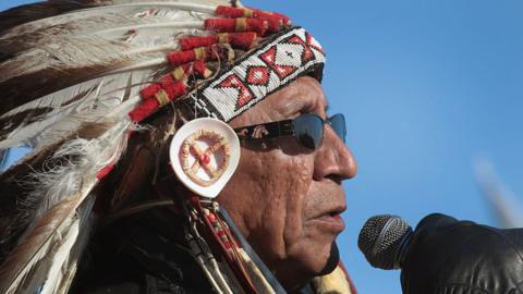 Chief Arvol Looking Horse of the Lakota/Dakota/Nakota Nation speaks during an interfaith ceremony at Oceti Sakowin Camp on the edge of the Standing Rock Sioux Reservation.