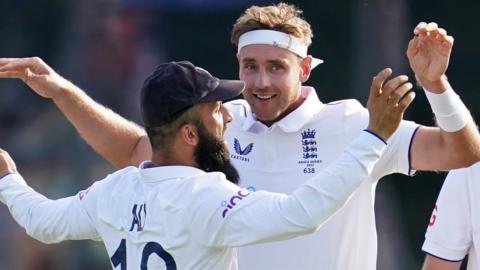 Stuart Broad celebrates with Moeen Ali