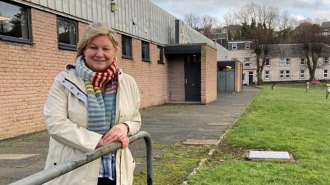 Councillor Caroline Cochrane at Victoria Park caravan park.