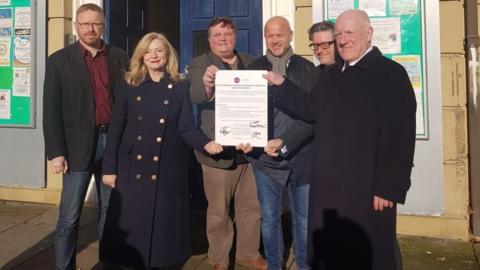 Candidates sign the pledge in Batley