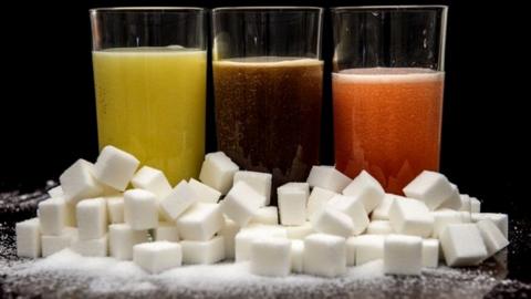 Soft drinks and sugar cubes