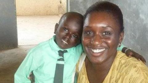 Doyin with a child she taught in the Gambia