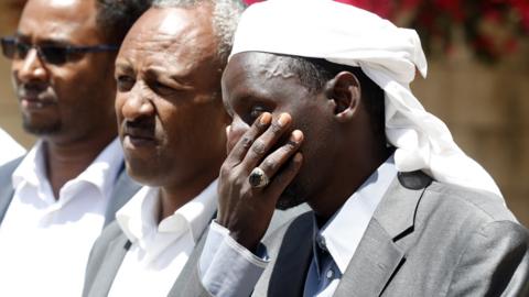 Members of African communities in Yemen gather outside the headquarters of the UN migration agency in Sanaa, Yemen (13 March 2021)