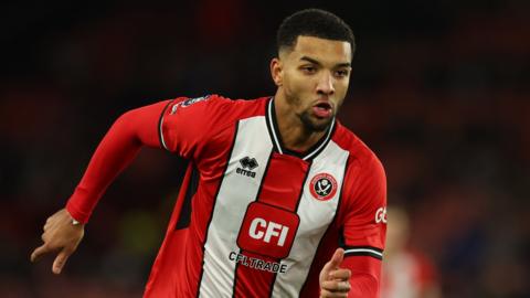 Mason Holgate playing for Sheffield United