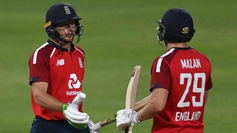 Jos Buttler and Dawid Malan go to shake hands