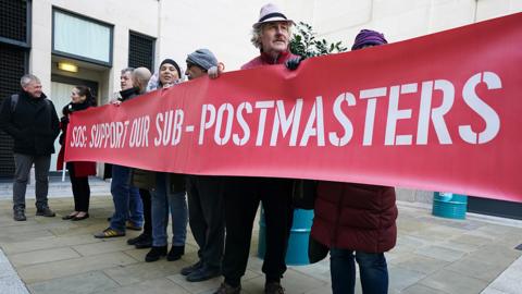 File photo shows protestors outside the Post Office Horizon IT inquiry at the International Dispute Resolution Centre in London on 8 December 2022