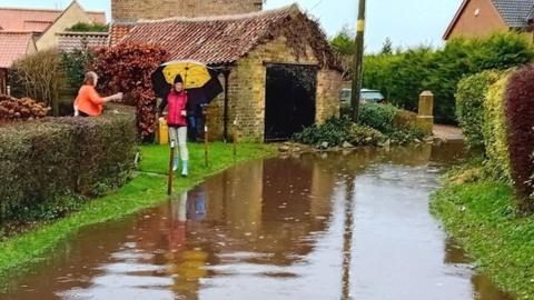 Flooding near homes at Scothern in West Lindsey