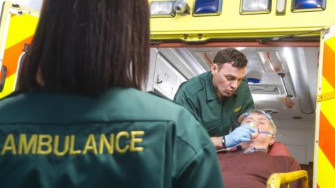 Elderly man in ambulance