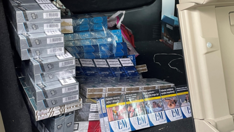 Stacks of illegal cigarettes