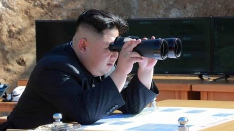 Kim Jong-un watching a missile launch through binoculars (July 2017)