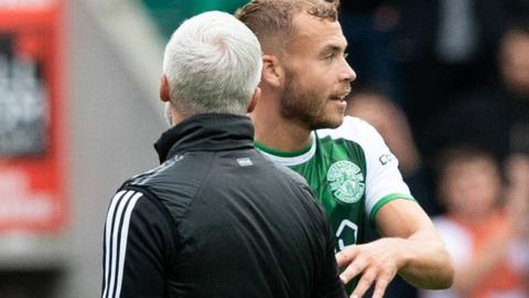 Aberdeen manager Jim Goodwin and Hibernian centre-half Ryan Porteous