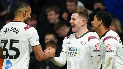 Derby County's James Collins celebrates his goal with team-mates