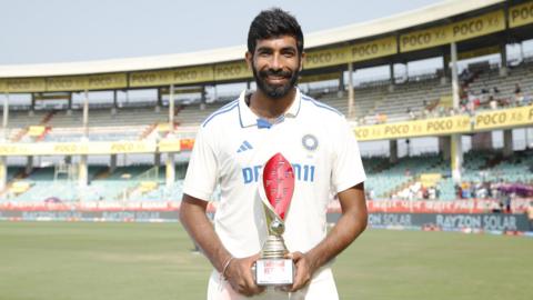 India fast bowler Jasprit Bumrah poses with the Player of the Match award after the second Test against England