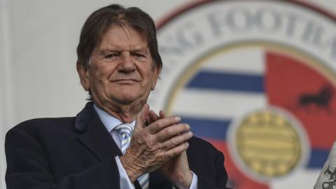 Ex-Reading chairman Sir John Madejski says he is "concerned" about the club's financial position but urges fans not to protest.