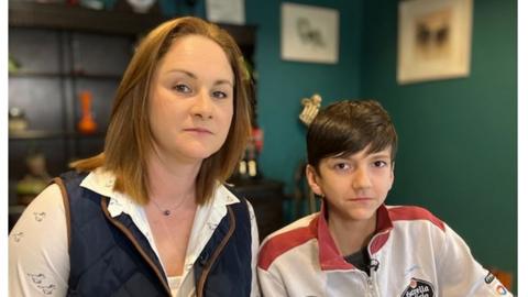 Jemma and George Pike warn his spinal curvature is getting worse, the longer the 12 -year-old waits for his operation