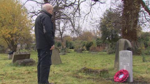 A wreath laid at the new gravestone for Gunner Peter Liddiard who died during WW1