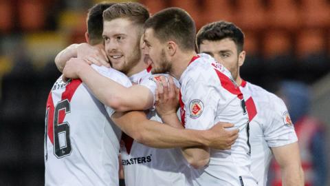 Airdrie's Callum Smith celebrates after making it 1-0 during a cinch Championship play-off final first leg match between Airdrieonians and Hamilton Academical at the Penny Cars Stadium