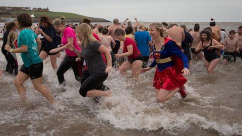 Beaches around the country have seen thousands turn up each year to brave the icy waters