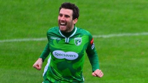 Ross Allen celebrates scoring for Guernsey FC