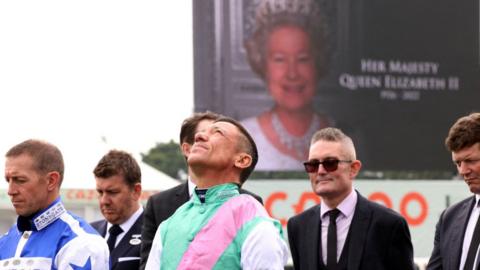 Jockeys including Frankie Dettori pay respects to the Queen at Doncaster