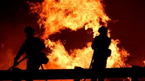 firefighters in Canyon Hill north of LA, 25 Oct