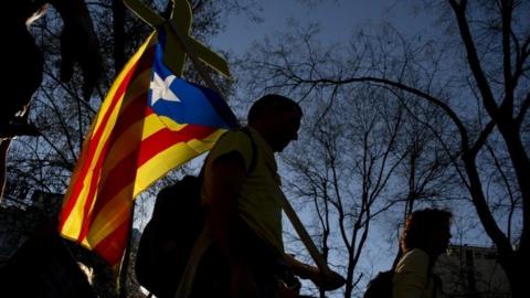 A protester with Catalan flag in Madrid, Spain. Photo: 16 March 2019