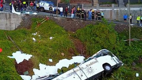 A bus carrying German tourists has plunged off a road and overturned on the Portuguese island of Madeira.