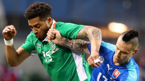 The Republic of Ireland's Cyrus Christie battles with Slovakia's Marek Hamsik in 2016