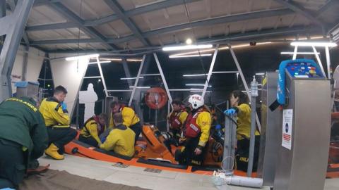 RNLI attending to the casualty