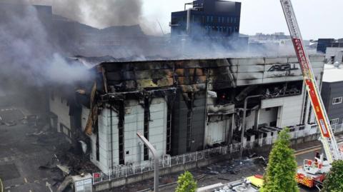 Plumes of smoke rising over the Aricell plant during the deadly blaze in June.