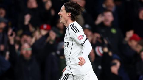 Harry Wilson of Fulham celebrates scoring his team's second goal 
